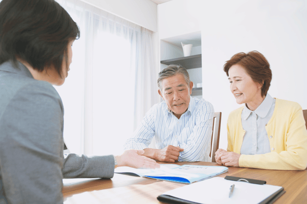 Senior couple reviewing tax-efficient retirement income strategies to reduce taxes and preserve wealth in retirement