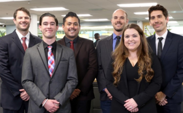 Business Support team at Tom Ligare's back office in San Diego, which researches carrier and product opportunities for NPPSS clients